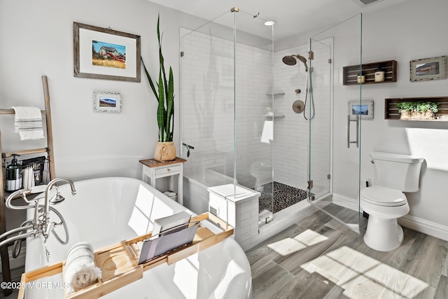 66 Banyan Blvd, Holmdel, NJ 07733 - full bathroom with wood finished floors, a stall shower, and a freestanding tub