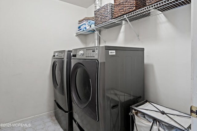 66 Banyan Blvd, Holmdel, NJ 07733 - washroom with independent washer and dryer and light marble finish floors