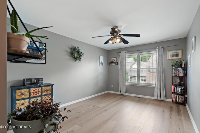 66 Banyan Blvd, Holmdel, NJ 07733 - living area featuring light wood-style floors and ceiling fan