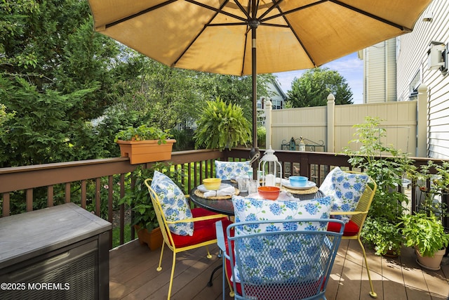 66 Banyan Blvd, Holmdel, NJ 07733 - wooden terrace featuring outdoor dining area