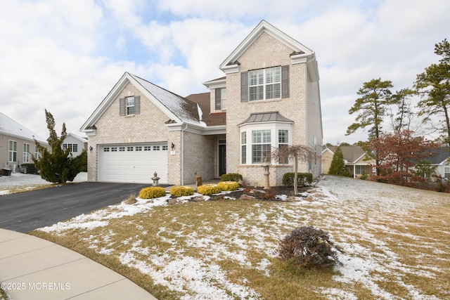 front of property featuring a garage