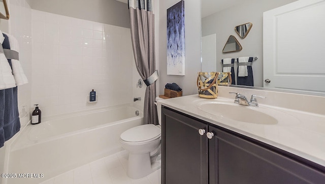 full bathroom with vanity, shower / tub combo, tile patterned floors, and toilet