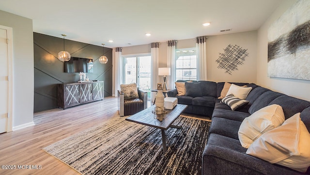 living room with light hardwood / wood-style floors