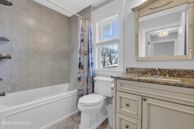 full bathroom featuring shower / bath combination with curtain, a healthy amount of sunlight, toilet, and vanity