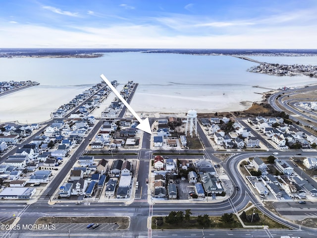 bird's eye view with a water view