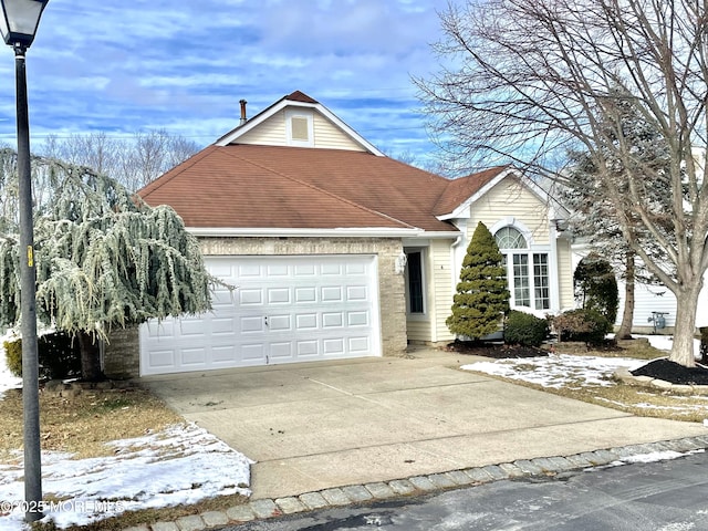 view of front of property with a garage