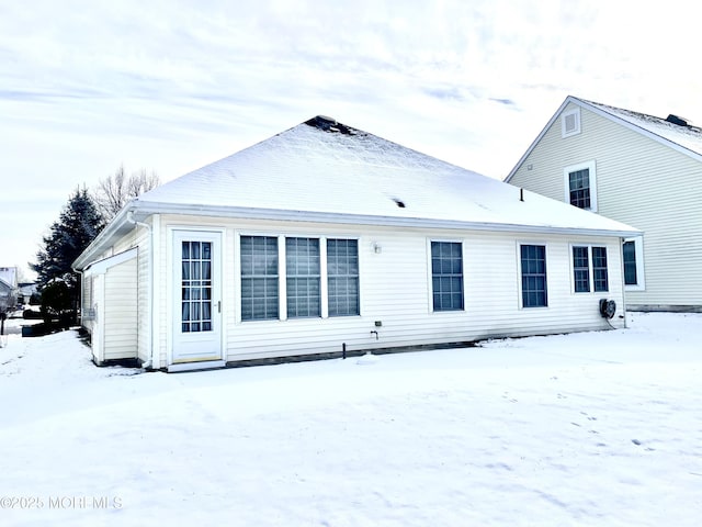 view of snow covered property