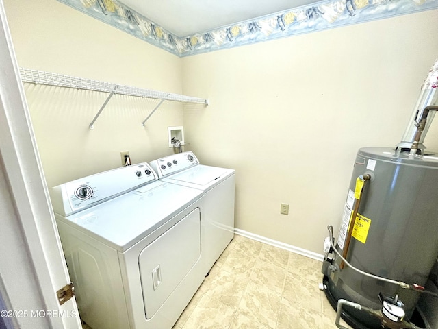 laundry area featuring independent washer and dryer and water heater