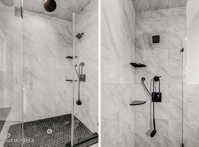 bathroom featuring a shower with shower door