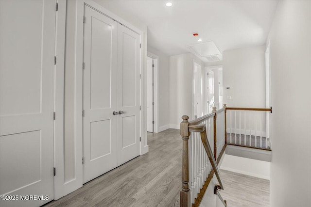 corridor with light wood-type flooring