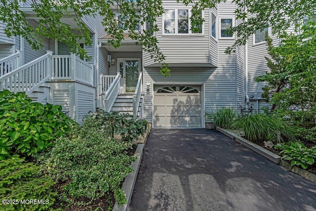 105 Geranium Ct, Toms River, NJ 08753 - doorway to property featuring a garage and driveway