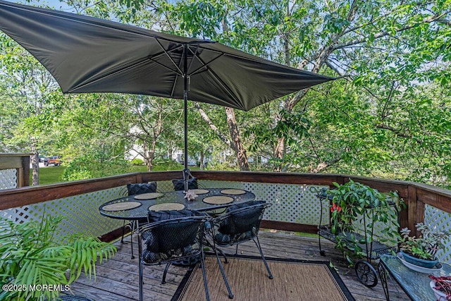 105 Geranium Ct, Toms River, NJ 08753 - wooden terrace with outdoor dining space