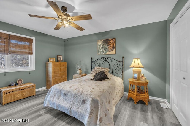 105 Geranium Ct, Toms River, NJ 08753 - bedroom with a closet, wood finished floors, and ceiling fan