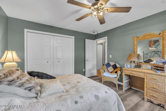 105 Geranium Ct, Toms River, NJ 08753 - bedroom with a closet, wood finished floors, and ceiling fan