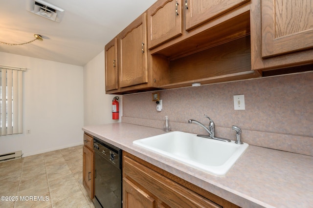 kitchen with black dishwasher, sink, and backsplash