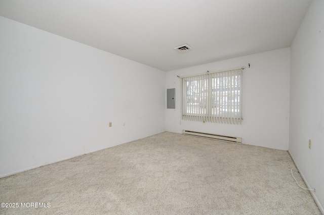 carpeted spare room with electric panel and baseboard heating