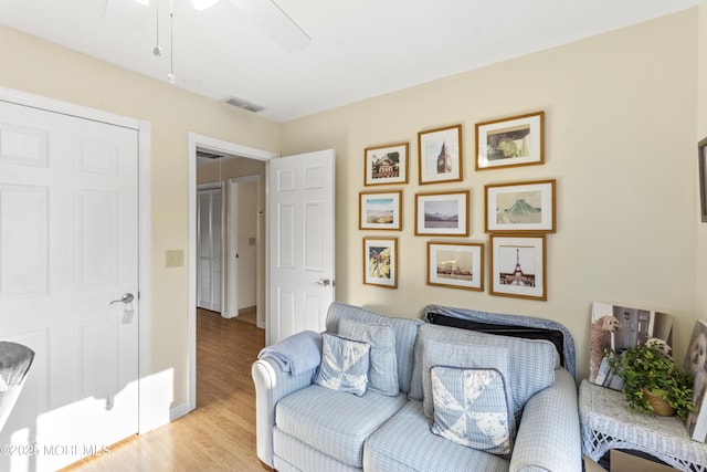 living room with light hardwood / wood-style flooring