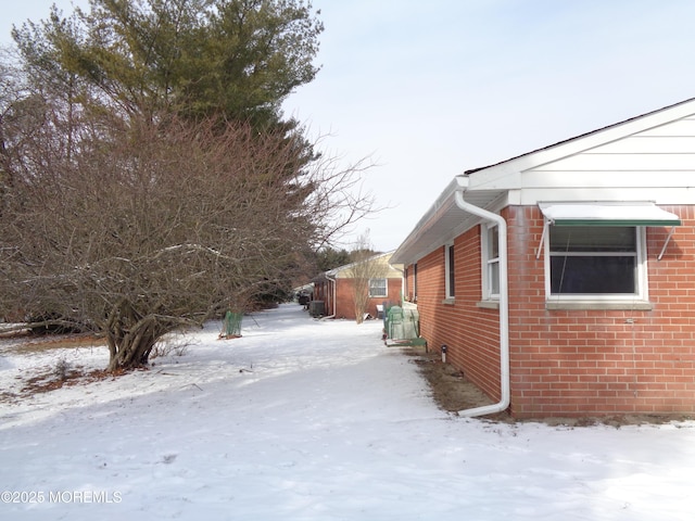 view of snow covered property