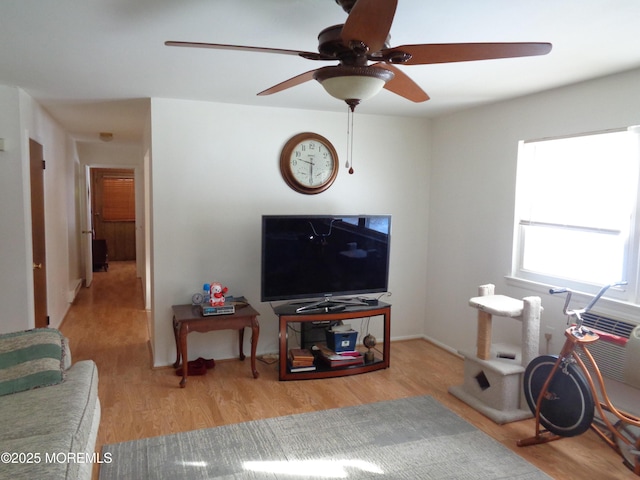 living room with light hardwood / wood-style flooring