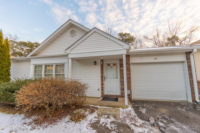 view of front of property with a garage