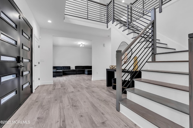 foyer with light hardwood / wood-style flooring