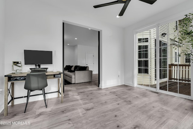 office area featuring ceiling fan and light hardwood / wood-style flooring