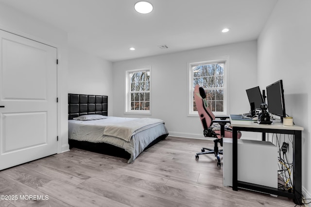 bedroom featuring light hardwood / wood-style flooring