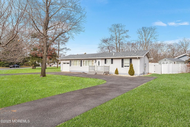 ranch-style home with a front yard