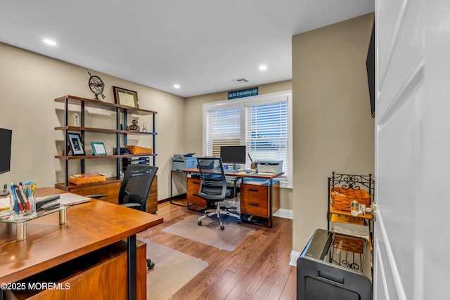 home office featuring hardwood / wood-style flooring