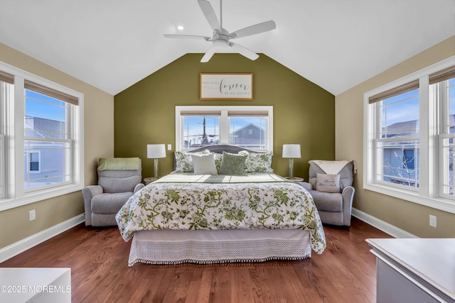 bedroom with ceiling fan, lofted ceiling, and dark hardwood / wood-style flooring