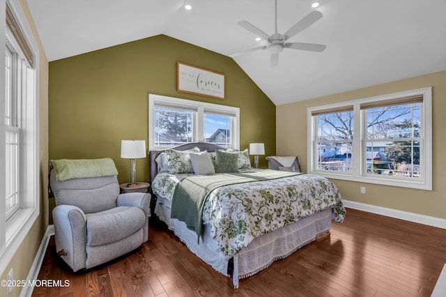 bedroom featuring lofted ceiling, dark hardwood / wood-style floors, and ceiling fan