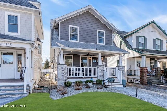 view of front of home featuring a front lawn and a porch