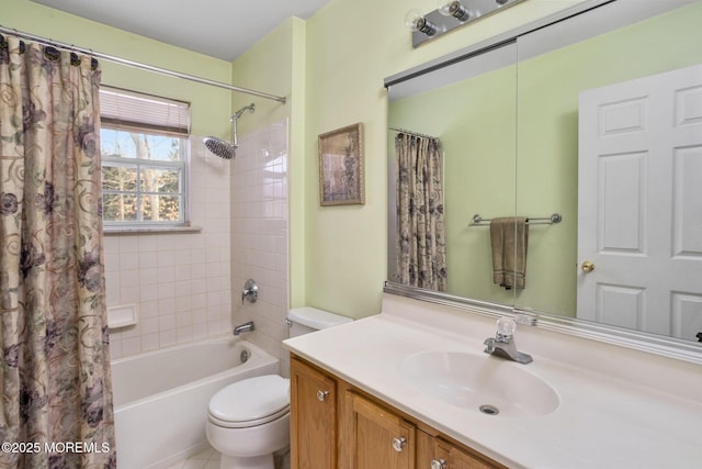 full bathroom with shower / tub combo with curtain, vanity, and toilet