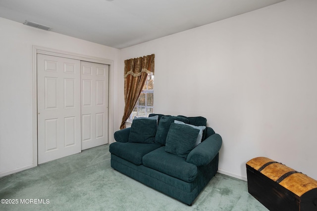 living area with carpet flooring