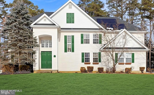 view of property featuring a front yard