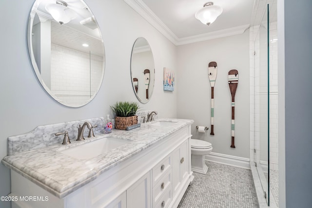 bathroom with vanity, crown molding, tile patterned floors, and toilet