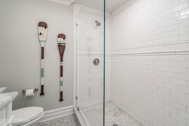 bathroom with toilet, vanity, tile patterned floors, and a shower with shower door