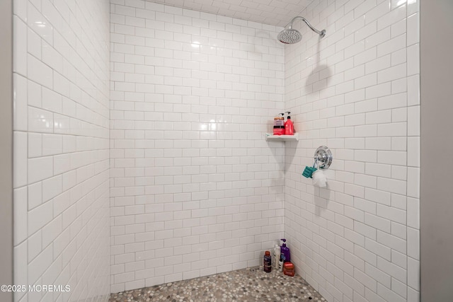 bathroom featuring tiled shower