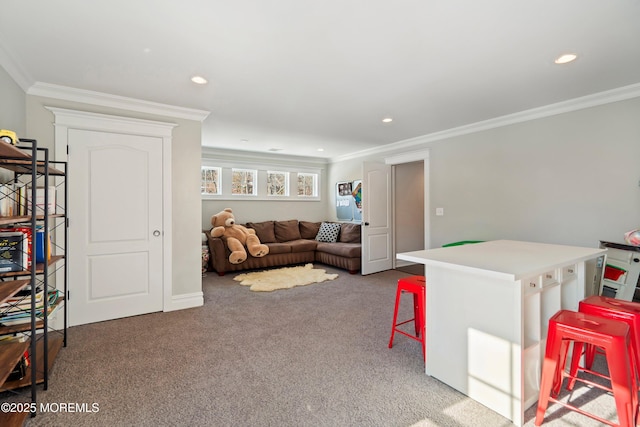 living room with ornamental molding and carpet floors