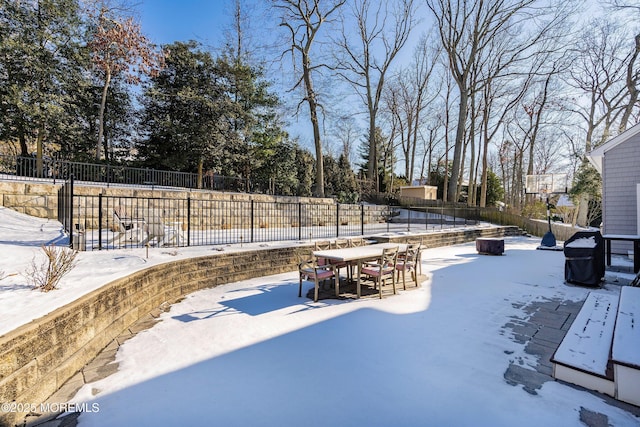 view of snow covered patio