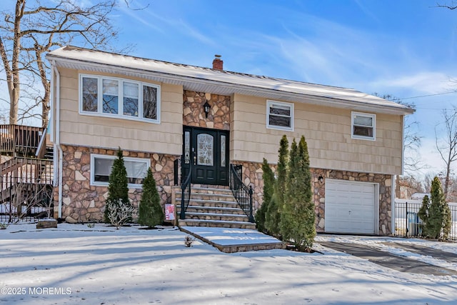 bi-level home with a garage