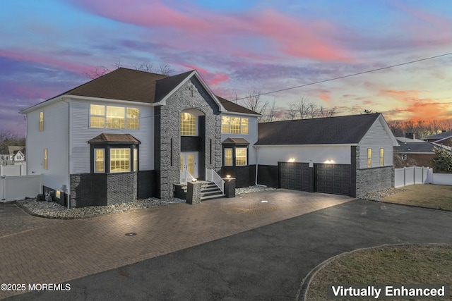 view of front of home with a garage