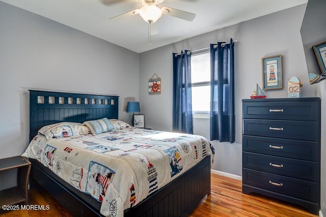 bedroom featuring ceiling fan and light wood-type flooring