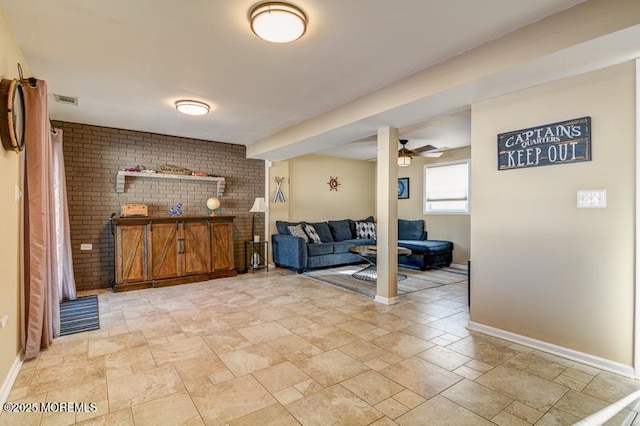 living room featuring ceiling fan