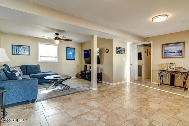 living room featuring ceiling fan