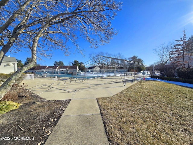 exterior space with tennis court