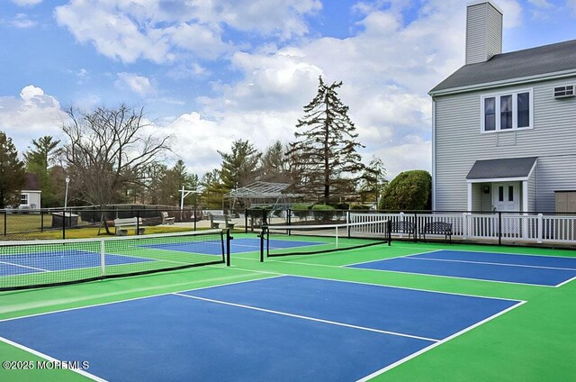 19B Plaza Del Campillo Unit 1000, Freehold, NJ 07728 - view of tennis court featuring community basketball court