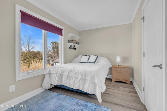 bedroom featuring light hardwood / wood-style flooring