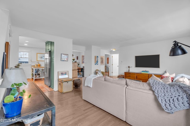 living room with light hardwood / wood-style flooring