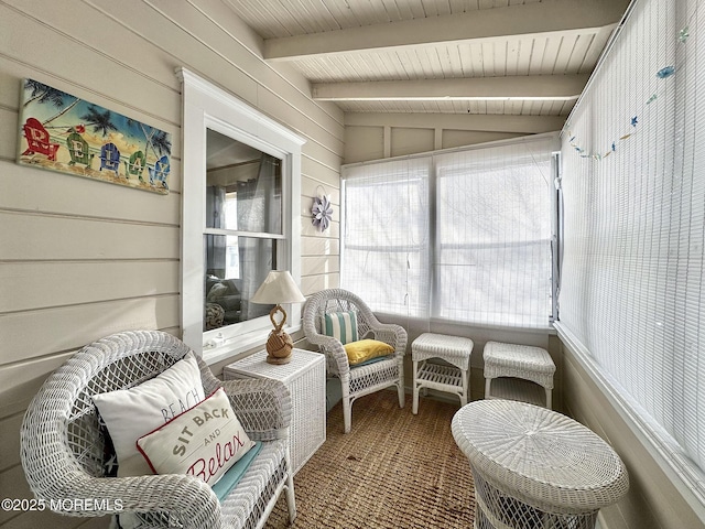 sunroom / solarium with lofted ceiling with beams and wooden ceiling